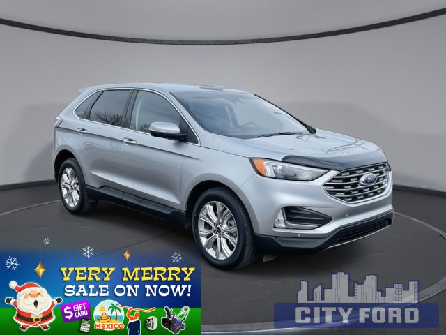 2023 Ford Edge Titanium AWD | Hand Free Liftgate with Foot Activation I Front & Rear Parking Sensors I Lane Keeping System I Remote Start I Reverse Camera I Power Heated Memory Driver Seat I B&O Audio System